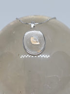 Included Quartz Pendant