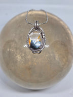 Golden Rutile Snake Pendant